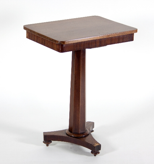 A 19th Century mahogany hall table with octagonal column support on a triform base,