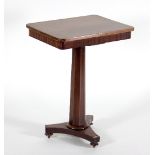 A 19th Century mahogany hall table with octagonal column support on a triform base,