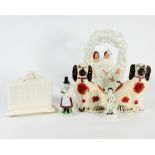 A Staffordshire porcelain figure of a man with a pipe and dog, another titled 'Welsh Costume',