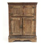 A Continental pine food cupboard enclosed by two pairs of doors, zinc lined,