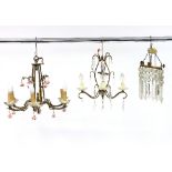 A six-branch chandelier hung with ceramic roses,