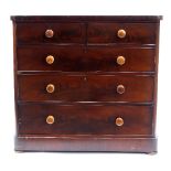 A mahogany chest of two short and three long drawers, with turned handles on plinth base,