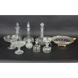 Three cut glass decanters, a large gilt metal mounted cut glass dish,