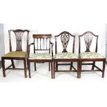A Regency mahogany armchair, fitted a loose trap seat on square tapering legs,
