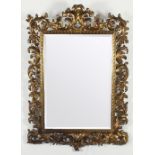 An 18th Century style gilded Florentine frame, with pierced scrolling acanthus border,