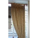 Two pairs of curtains with foliate woven detailing in cream and pale brown,