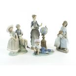 Four pieces of Lladro porcelain to include 'School Marm' and a boy and girl seated with a guitar,