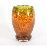 A large studio glass vase with mottled orange and green colouring, 25.