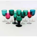 Various coloured wine glasses,