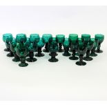 Twenty two green glass rummers, 11.