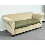 An upholstered two-seater sofa on square tapering front legs,
