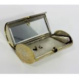 A silver vanity case,