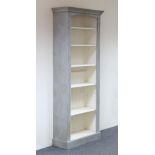 A painted pine bookshelf in grey and cream with adjustable shelves,