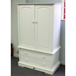 A child's wardrobe fitted double door hanging space, two drawers below,