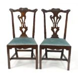 A pair of late 18th Century mahogany dining chairs,