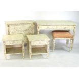 A modern cream and gilt painted bedroom suite comprising a desk with two drawers,