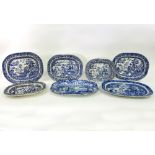 A 19th Century blue and white transferware meat plate decorated with castle and ruins in a