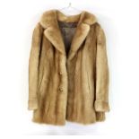 A lady's mink short coat,