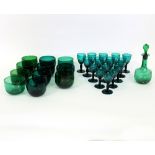 A collection of Bristol green glass comprising eleven finger bowls,