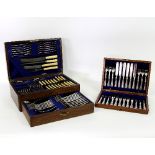 Twelve pairs of fish knives and forks in a fitted case and a canteen of old English pattern cutlery,