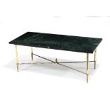 A marble top table on octagonal tapered legs and X-shaped stretcher,