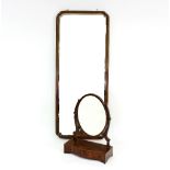 A mahogany toilet mirror with oval swing mirror,