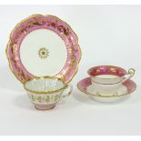 A Spode cup, saucer and plate with gilt and puce borders,