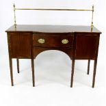A mahogany bowfront sideboard, fitted a brass gallery to the top above single drawer to centre,