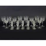 Ten thistle-shaped liqueur glasses with border of thistles and ten Webb Crystal cut glasses