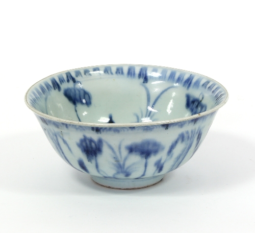 A Chinese provincial blue and white bowl, Ming dynasty, painted with flowers, 15.