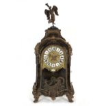 A 19th Century tortoiseshell and gilt metal bracket clock of boulle design with classical gilt