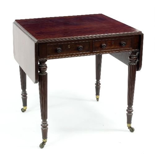 A mahogany two-flap table in the manner of Gillows,