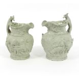 A graduated pair of 19th Century Charles Meigh jugs depicting foxes and hounds,