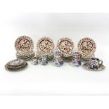 Thirty-five Ironstone plates decorated vases with acanthus in orange, black and gilt,