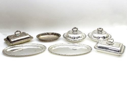 A pair of silver plated circular entrée dishes with gadroon borders and detachable handles,