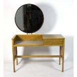 G-Plan, a 1960s oak dressing table, mounted with a circular mirror,