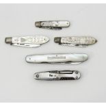 Two Victorian fruit knives with silver blades and engraved mother-of-pearl mounts,