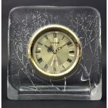 A Lalique style modern glass mantel clock with a frosted and moulded design of branches to verso