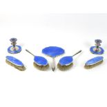 A silver and blue guilloche enamel dressing set, Birmingham 1930,