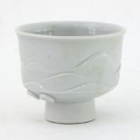 Russell Collins, Hook Norton Pottery/A white glazed porcelain tea bowl with tall footrim, 10.