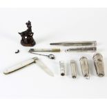 Three silver cheroot holders, a Fonou silver pencil, two silver needle cases,