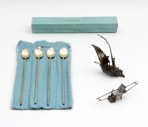 A set of four long stemmed silver spoons, Tiffany & Co.