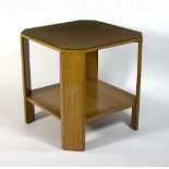 A Wake & Dean two-tier occasional table, with canted edges and glazed top,