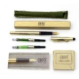 A Cross fountain pen with a 14ct gold nib and gold plated case,