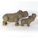 Ronald Pennell (British, born 1935)/Hippos/laminated MDF, carved and painted,