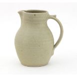 Russell Collins, Hook Norton Pottery/An oatmeal glazed two-pint stoneware jug, impressed marks, 18.