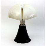 A mid 20th Century table lamp with moulded stylised dome cover in white and tapered circular black