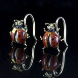 A pair of ladybird earrings,