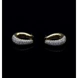 A pair of diamond earrings, the 18ct yellow gold hoops pave set with brilliant cut diamonds,