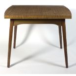 A Guildform of Guildford extending laminated dining table,